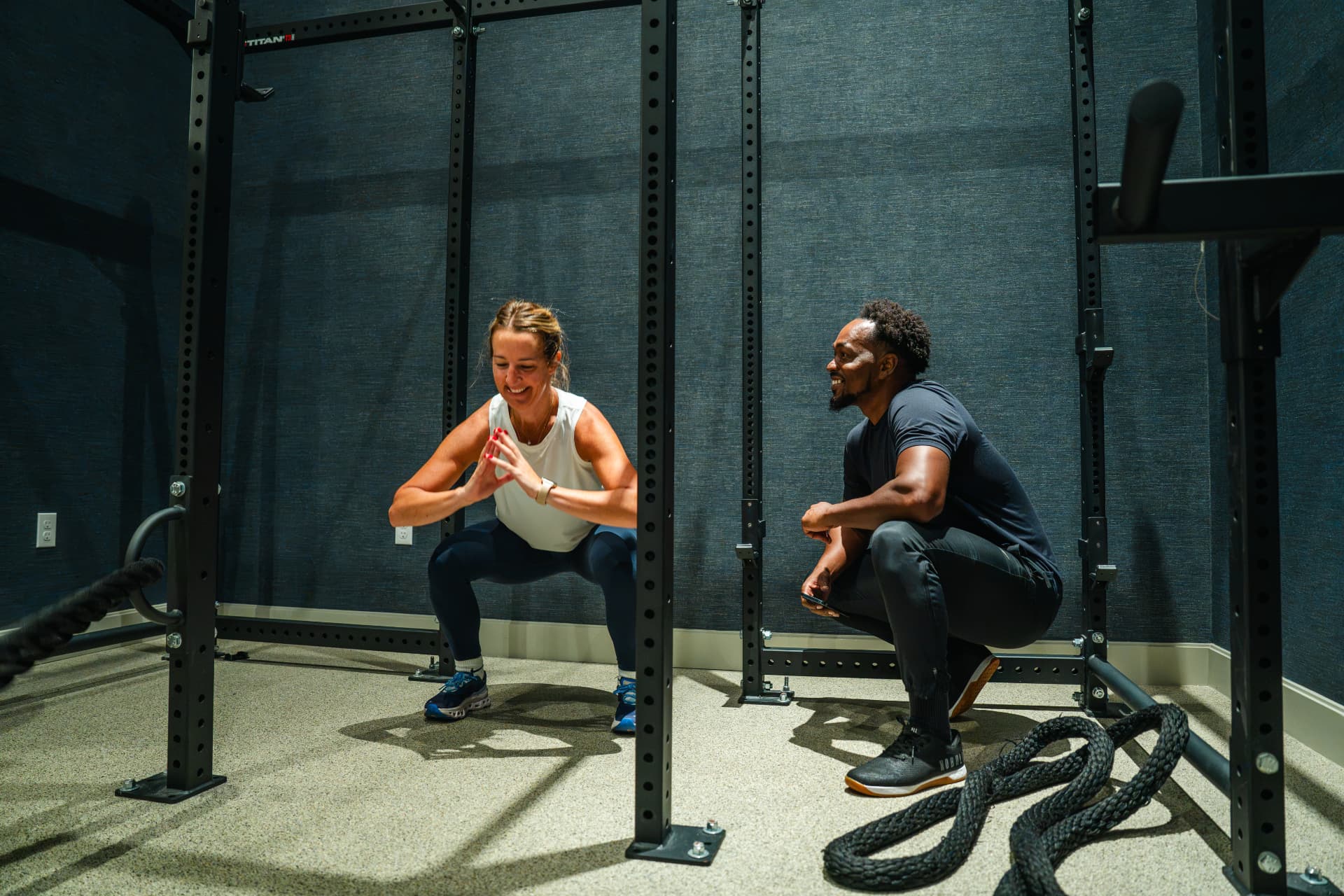 A PerryPerformFit trainer reviewing progress with a client